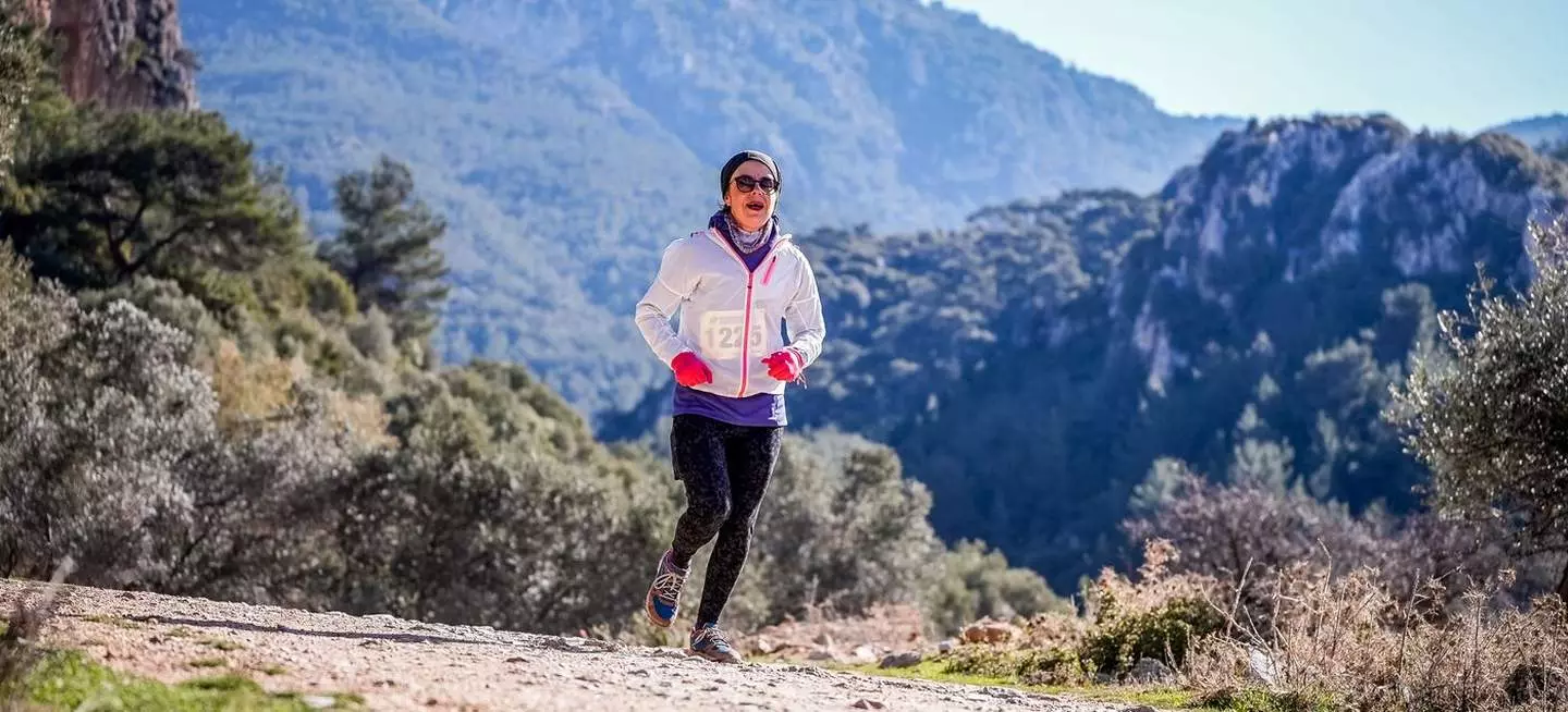 Trail runner on a mountain path